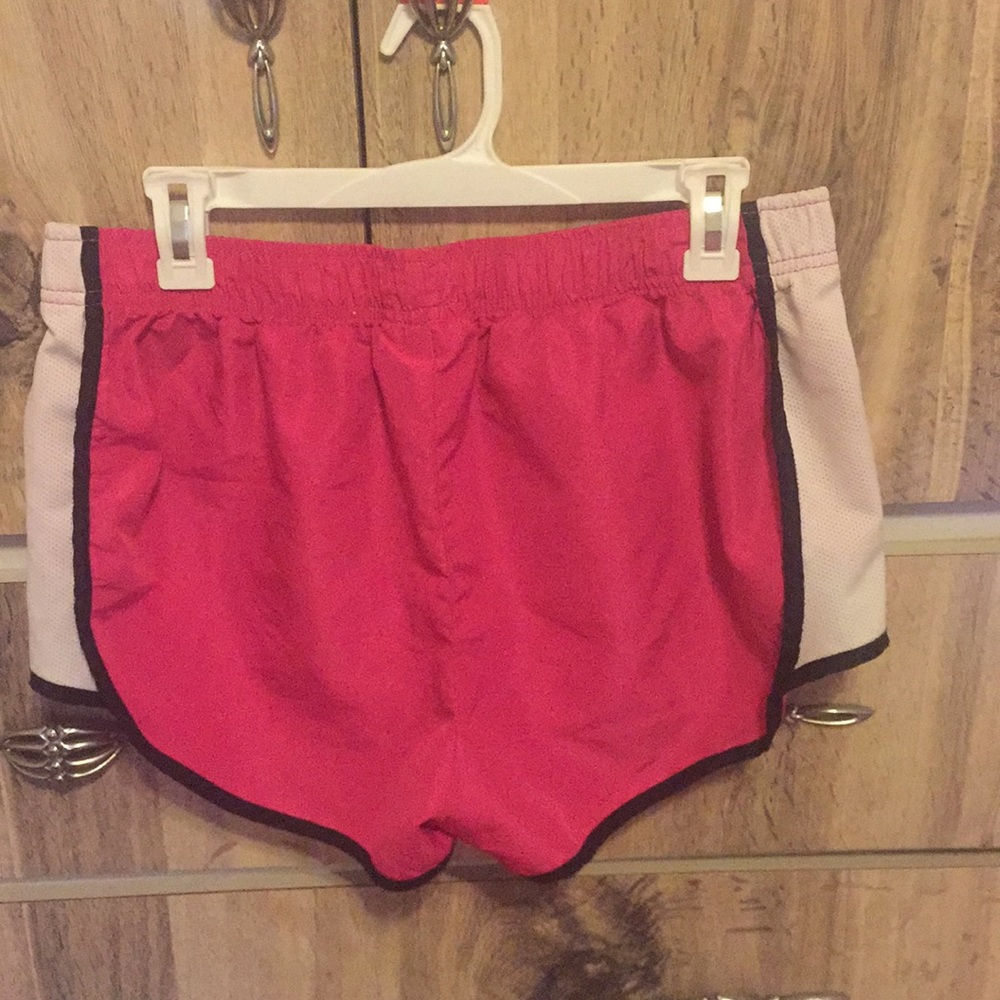Pink running shorts